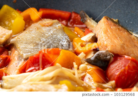 Stir-fried salmon and mushrooms with butter ponzu sauce. 103129568