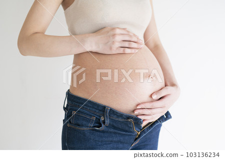 Pregnant young woman, white background Pregnant young woman, white background 103136234