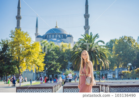 Woman tourist enjoying the view Blue Mosque, Sultanahmet Camii, Istanbul, Turkey 103136490