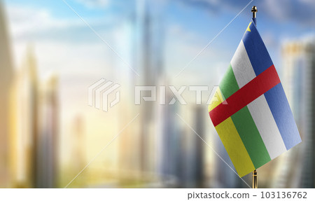 Small flags of the Central African Republic on an abstract blurry background Small flags of the Central African Republic on an abstract blurry background 103136762