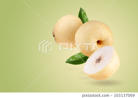 Fresh group oriental pear on a green background Fresh group oriental pear on a green background 103137009