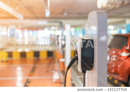 EV charger station for Electric car charging battery at station. green energy power, Eco friendly alternative, technology and environment concepts EV charger station for Electric car charging battery at station. green energy power, Eco friendly alternative, technology and environment concepts 103137708