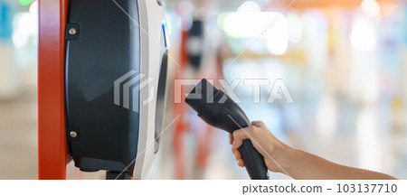 EV charger station for Electric car charging battery at station. green energy power, Eco friendly alternative, technology and environment concepts 103137710