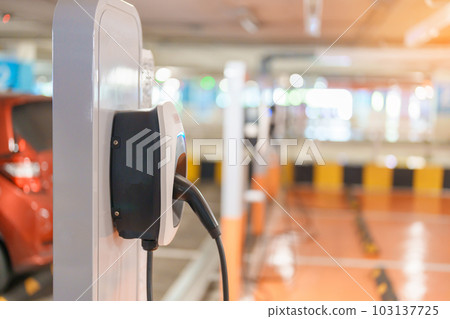 EV charger station for Electric car charging battery at station. green energy power, Eco friendly alternative, technology and environment concepts 103137725