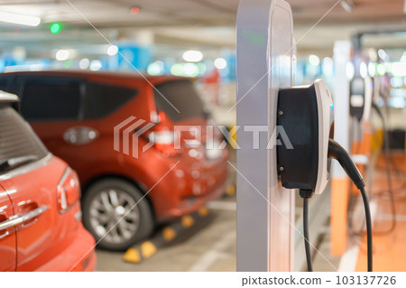 EV charger station for Electric car charging battery at station. green energy power, Eco friendly alternative, technology and environment concepts 103137726