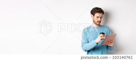 Man browsing online in digital tablet and drinking coffee from paper cup, standing over white background Man browsing online in digital tablet and drinking coffee from paper cup, standing over white background 103140761