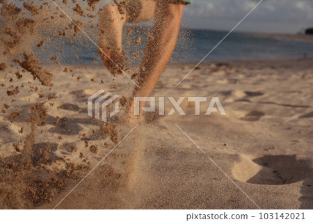 close-up. feet in the sand. run close-up. feet in the sand. run 103142021