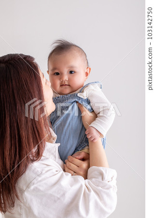 baby being held baby being held 103142750