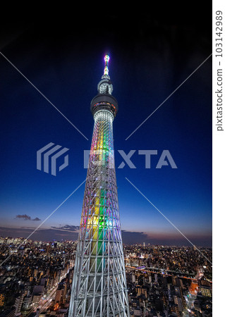 Rainbow colored Tokyo Skytree soaring in the night sky Rainbow colored Tokyo Skytree soaring in the night sky 103142989