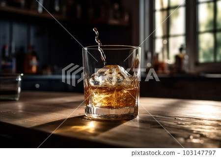 Whiskey is poured into tumbler with splash. Whiskey on rocks. AI generated. 103147797