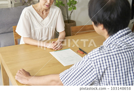 Middle-aged divorce Middle-aged woman talking about divorce Faceless 103148658