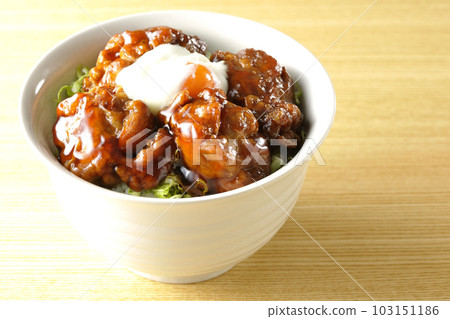 Deep-fried rice bowl topped with soft-boiled egg Deep-fried rice bowl topped with soft-boiled egg 103151186