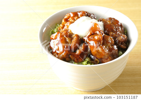 Deep-fried rice bowl topped with soft-boiled egg Deep-fried rice bowl topped with soft-boiled egg 103151187