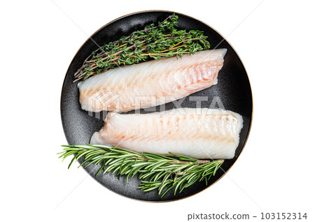 Raw cod loin fillet steaks with herbs on plate. Isolated on white background. Raw cod loin fillet steaks with herbs on plate. Isolated on white background. 103152314