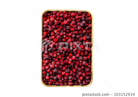 Frozen cranberries in a wooden bowl. Isolated on white background. Frozen cranberries in a wooden bowl. Isolated on white background. 103152919