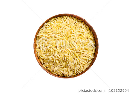 uncooked Orzo paste. Recipe for risoni with Basil leaves, tomatoes and garlic. Isolated on white background. 103152994