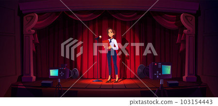 Female presenter smiling near microphone on stage 103154443