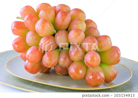 Grapes served on a ceramic plate Grapes served on a ceramic plate 103154913
