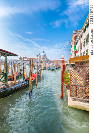 cityscape of Venice with famous Canal Grande and Basilica di Santa Maria della Salute church. cityscape of Venice with famous Canal Grande and Basilica di Santa Maria della Salute church. 103156732