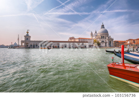 cityscape of Venice with famous Canal Grande and Basilica di Santa Maria della Salute church. 103156736