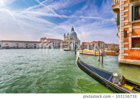cityscape of Venice with famous Canal Grande and Basilica di Santa Maria della Salute church. cityscape of Venice with famous Canal Grande and Basilica di Santa Maria della Salute church. 103156738