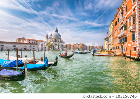 cityscape of Venice with famous Canal Grande and Basilica di Santa Maria della Salute church. cityscape of Venice with famous Canal Grande and Basilica di Santa Maria della Salute church. 103156740