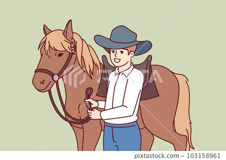 Cowboy boy is standing next to horse caring for stallion and wanting to become professional jockey Cowboy boy is standing next to horse caring for stallion and wanting to become professional jockey 103158961