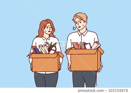 Dismissed man and woman with boxes leave workplaces after reduction of company staff due to crisis 103158978