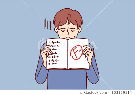 Boy shows school notebook with bad mark from teacher and looks down disappointedly after failed test 103159114