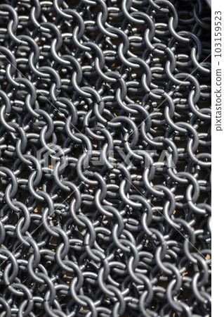 Vertical texture of metal chain mail 103159523