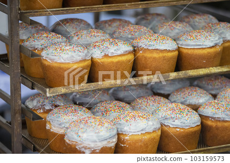 Pallets with baked Easter. Industrial production of Easter cakes. Bakery. 103159573