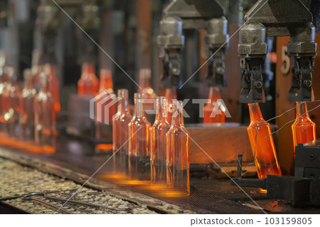 Glassworks. Glass industry. The process of making glass bottles. Glassworks. Glass industry. The process of making glass bottles. 103159805