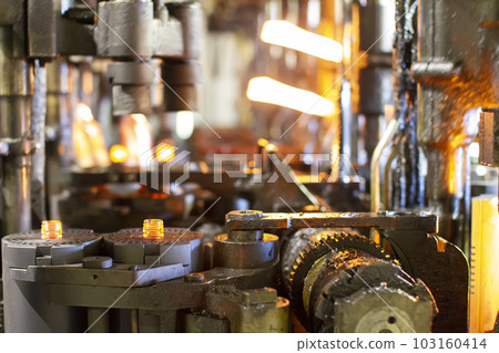 Glassworks. Glass industry. Machine conveyor for the manufacture of glass bottles. Glassworks. Glass industry. Machine conveyor for the manufacture of glass bottles. 103160414