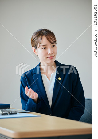 Young female lawyer receiving legal advice Young female lawyer receiving legal advice 103162001