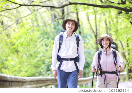 men and women hiking 103162324