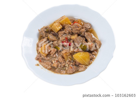 Turkish traditional tas kebab with potato, pea and tomato in a white plate Kebap. High quality photo 103162603