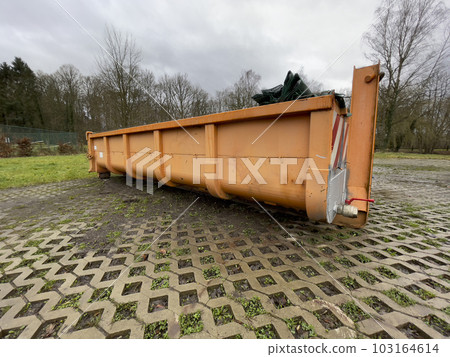 Yard waste dumpster. Construction dumpster for bulky household waste or loaded dumpster Yard waste dumpster. Construction dumpster for bulky household waste or loaded dumpster 103164614