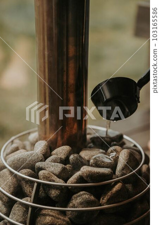 People who enjoy steaming in a sauna 103165586