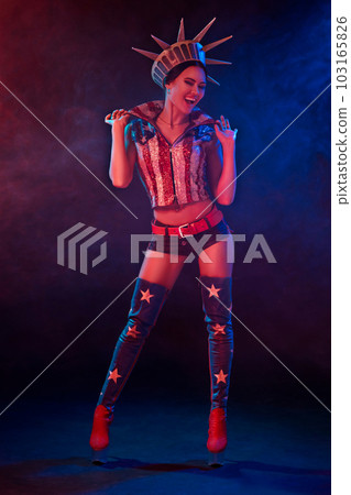 sexy young woman in erotic fetish wear dancing striptease in nightclub. Nude sexy woman in Show suit. sexy young woman in erotic fetish wear dancing striptease in nightclub. Nude sexy woman in Show suit. 103165826
