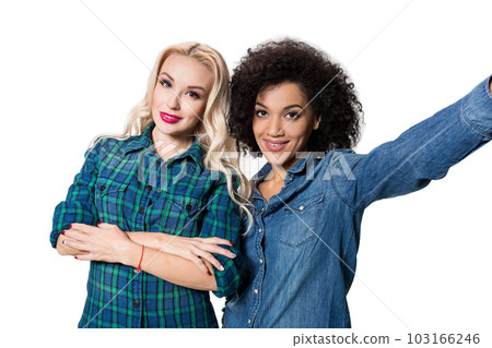 Two beautiful girls making selfie Two beautiful girls making selfie 103166246