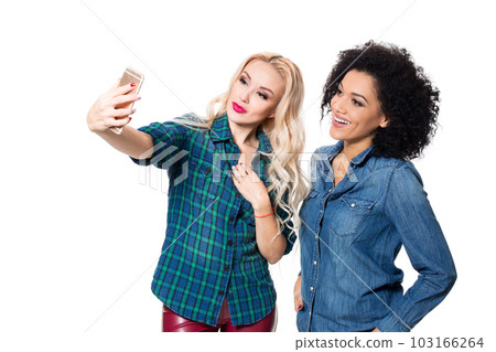 Two beautiful girls making selfie 103166264