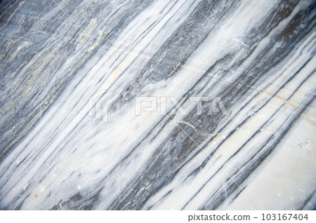 Natural background. A section of marble stone. A rock made of marble. Pyramids of stones Natural background. A section of marble stone. A rock made of marble. Pyramids of stones 103167404