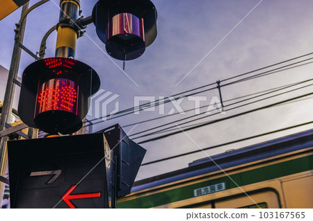 Railroad crossing in the evening Railroad crossing in the evening 103167565