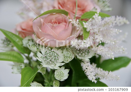 Bouquet of pink Japanese roses and white flowers Bouquet of pink Japanese roses and white flowers 103167909