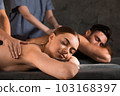 Couple lying on massage at spa 103168397