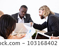 Diverse business people work in office 103168402