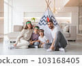 Family playing indian at home 103168405