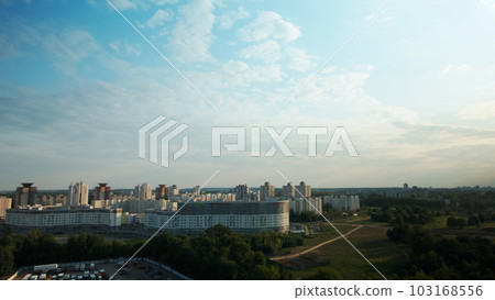 City highway. Cars slow down at the intersection. On the horizon at home. Aerial photography. City highway. Cars slow down at the intersection. On the horizon at home. Aerial photography. 103168556