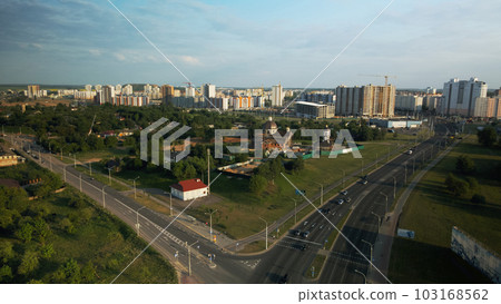 City highway. Overpass across the river. On the horizon at home. Aerial photography. City highway. Overpass across the river. On the horizon at home. Aerial photography. 103168562