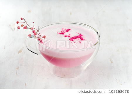 Pink matcha latte with milk. Trendy drink from dragon fruit powder 103168678